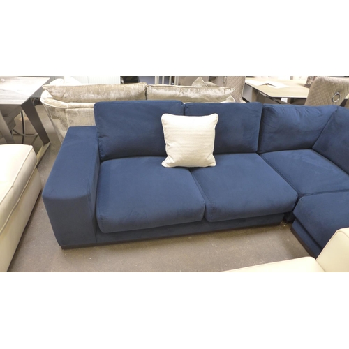 1481 - A large blue velvet six seater loft corner sofa on wooden base