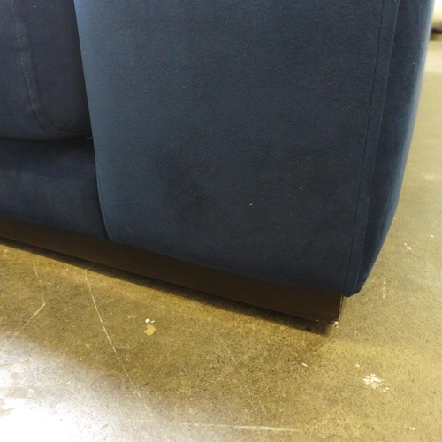 1481 - A large blue velvet six seater loft corner sofa on wooden base