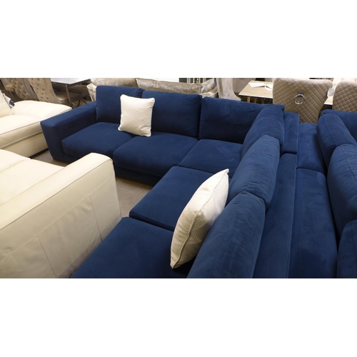 1481 - A large blue velvet six seater loft corner sofa on wooden base