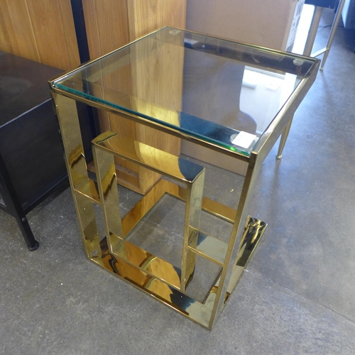 1533 - A gold metal and glass side table * this lot is subject to VAT