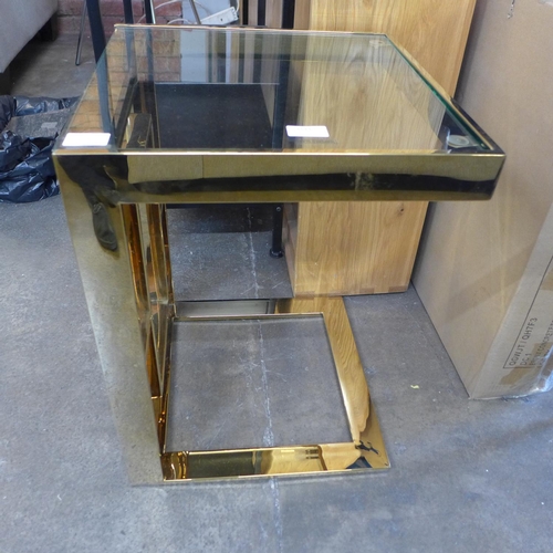 1533 - A gold metal and glass side table * this lot is subject to VAT