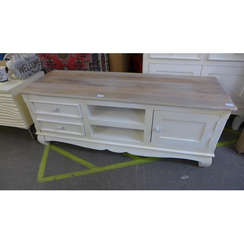 1545 - A rustic cream painted and hardwood TV unit, damaged * this lot is subject to VAT