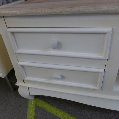 1545 - A rustic cream painted and hardwood TV unit, damaged * this lot is subject to VAT