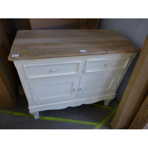 1546 - A rustic cream painted and hardwood small sideboard * this lot is subject to VAT