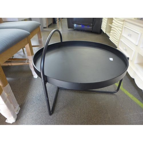 1552 - A black circular coffee table in an industrial style * this lot is subject to VAT