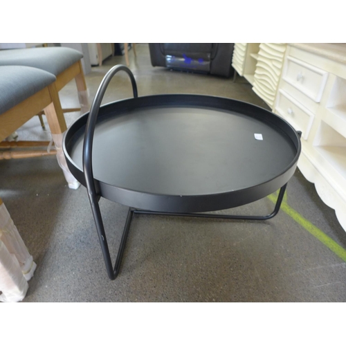 1554 - A black circular coffee table in an industrial style * this lot is subject to VAT