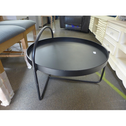 1555 - A black circular coffee table in an industrial style * this lot is subject to VAT