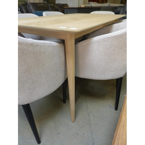 1560 - A Scandinavian style ash dining table and six cream dining chairs with black legs * this lot is subj... 