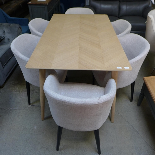 1560 - A Scandinavian style ash dining table and six cream dining chairs with black legs * this lot is subj... 