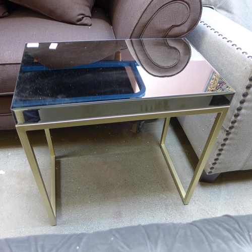 1574 - A mirrored side table with gold base * this lot is subject to VAT