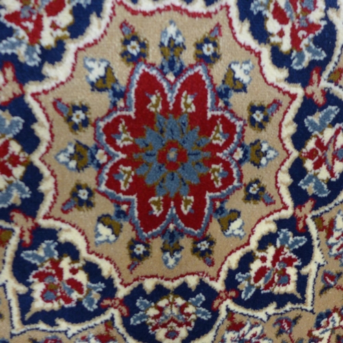 1582 - A cream full pile Cashmere rug with central Shabass medallion design, 230cm x 160cm