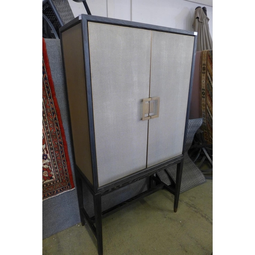 1591 - A black and grey leather effect two door drinks cabinet * this lot is subject to VAT