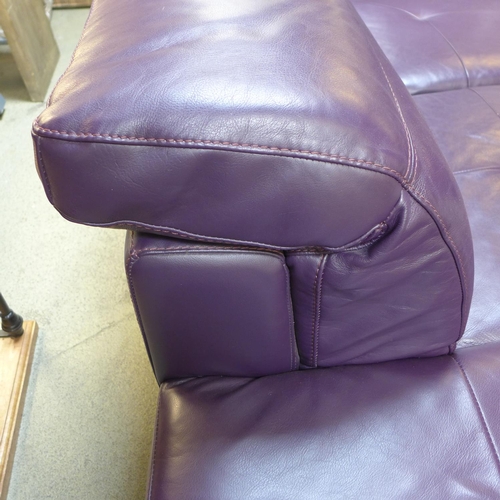 1621 - A purple leather corner sofa