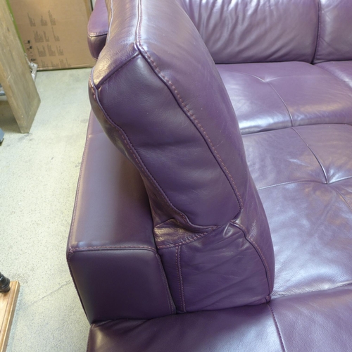 1621 - A purple leather corner sofa