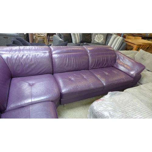 1621 - A purple leather corner sofa