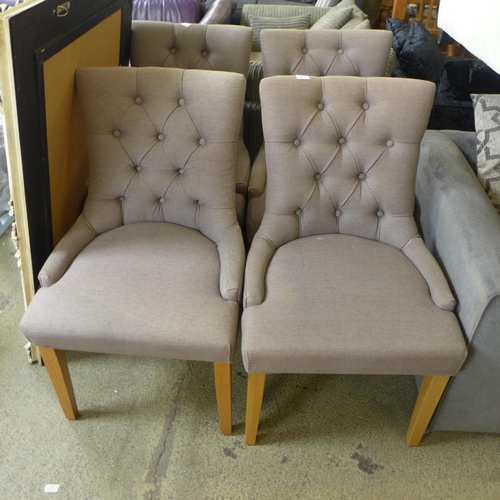 1627 - A set of four grey upholstered buttoned dining chairs