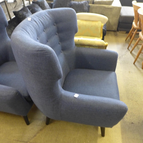 1630 - A blue upholstered button back wing armchair