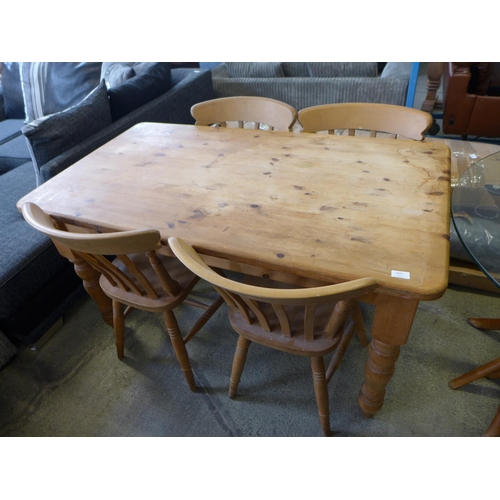 1633 - A pine farmhouse dining table and four chairs