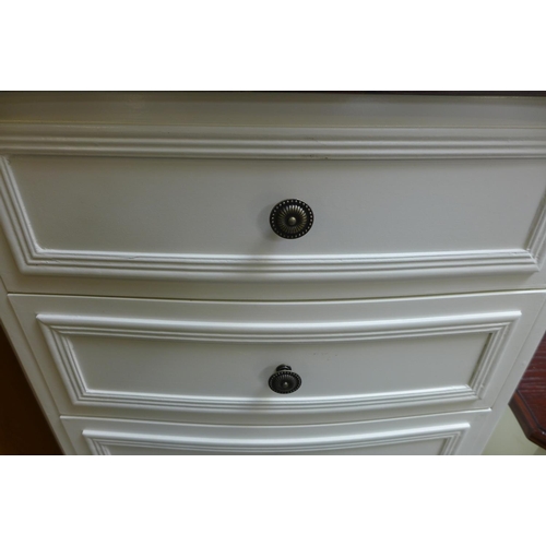 1664 - A five drawer tallboy with contrasting top