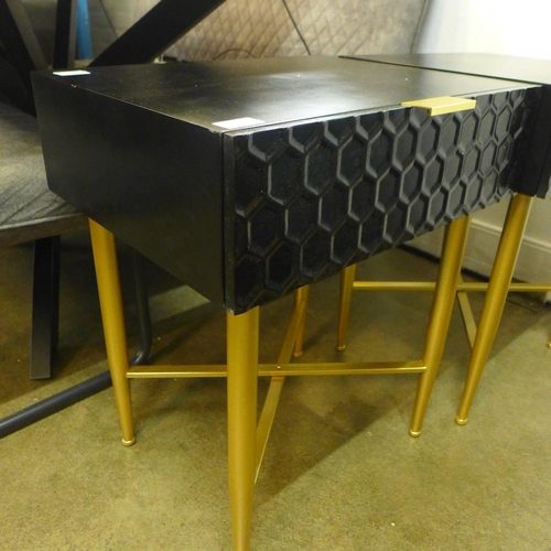 1340 - A pair of black bedside tables with gold legs