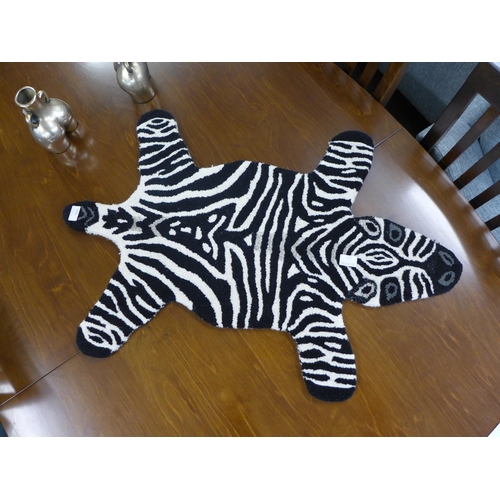 1470 - A child's rug in the form of a zebra