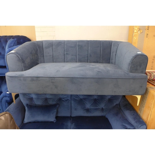 1490 - A shell back, blue 2.5 seater sofa on brushed steel legs