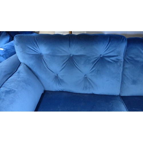 1491 - A Moxton blue velvet three seater button back sofa