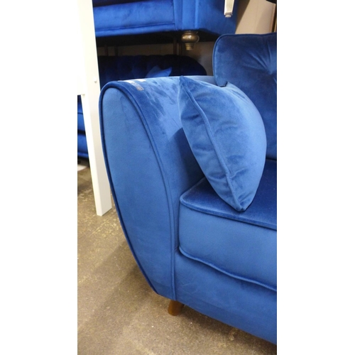 1491 - A Moxton blue velvet three seater button back sofa