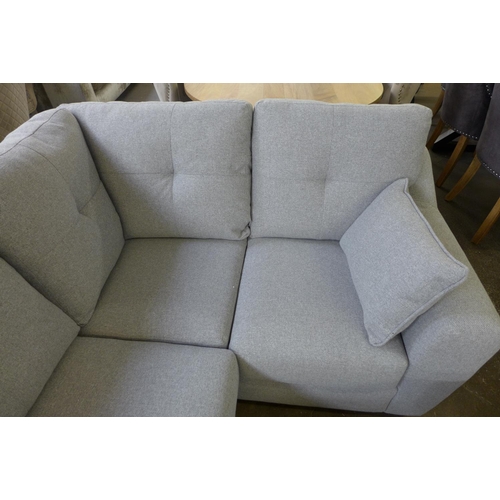 1502 - A small grey textured weave upholstered corner sofa