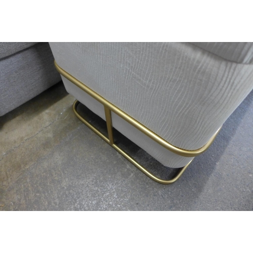 1504 - A cream upholstered storage stool with gold legs