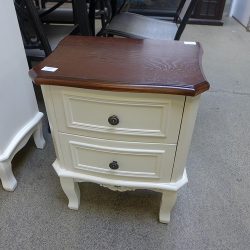 1663 - A two drawer bedside chest with contrasting top