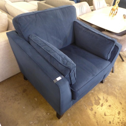 1501 - A navy blue velvet upholstered armchair