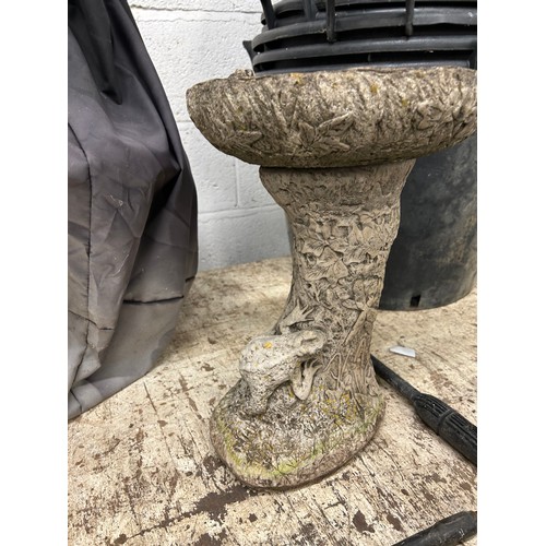 2290 - 2 Ground bird baths, one other bird bath on a stand and an assortment of garden ornaments