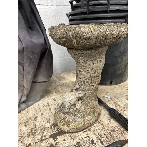 2290 - 2 Ground bird baths, one other bird bath on a stand and an assortment of garden ornaments