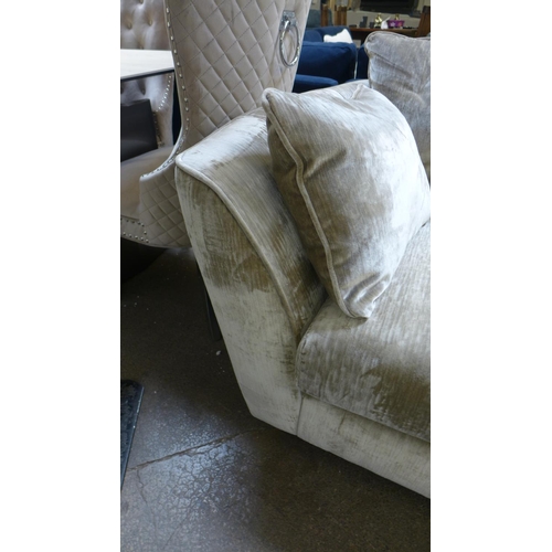 1469 - A champagne crushed velvet three seater sofa