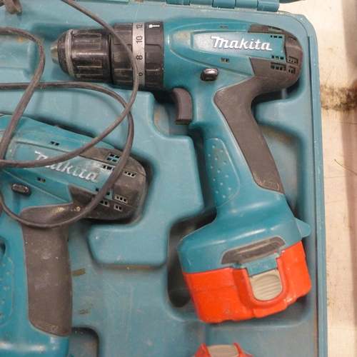 2034 - Makita drill set with 4 batteries & charger