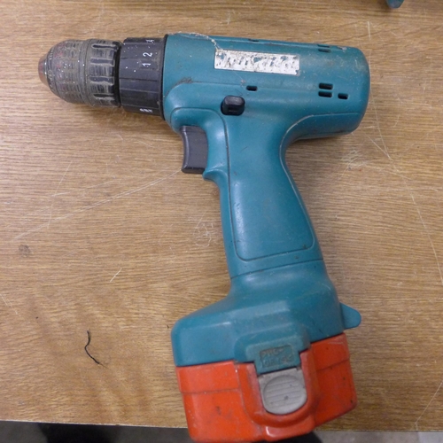 2037 - Makita chainsaw, torch & 2 drills with 3 batteries