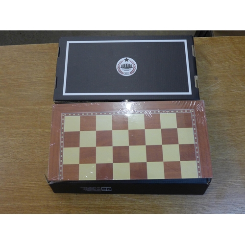 2093 - 2 Homemari wooden chess sets - sealed