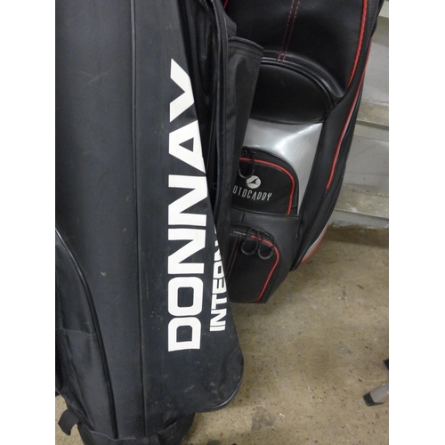 2391 - 3 Golf bags with approx. 30 clubs & solo golf trolley attachment