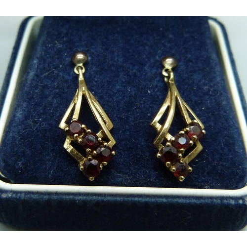 1003 - Two pairs of 9ct gold earrings, garnets and sapphire and white stones