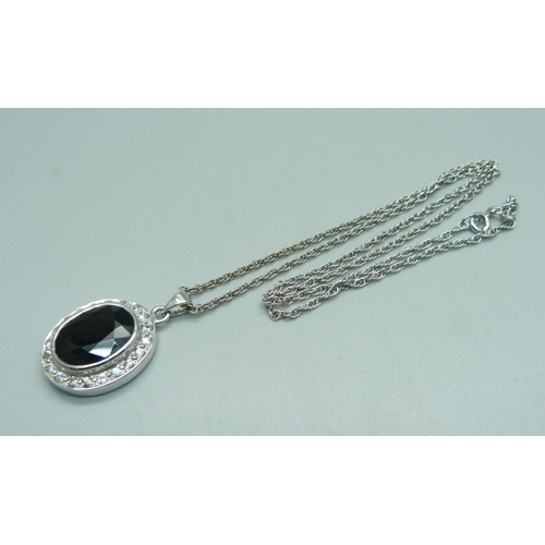 1006 - A 9ct white gold, white stone and onyx pendant on a 9ct white gold chain, total weight 10.1g