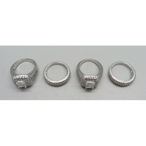 1012 - Four new and unused silver dress rings, stamped S925