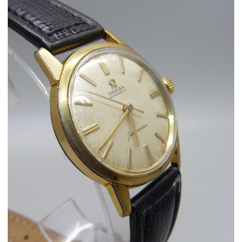 1021 - A gold plated Omega Seamaster automatic wristwatch, with box