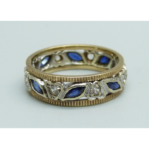 1024 - A 9ct gold, blue and white stone ring, 3.5g, N