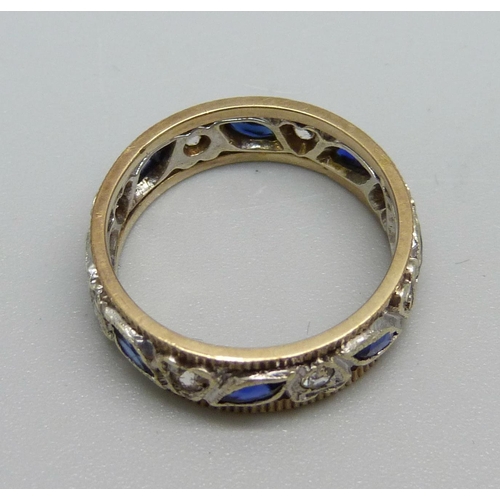 1024 - A 9ct gold, blue and white stone ring, 3.5g, N