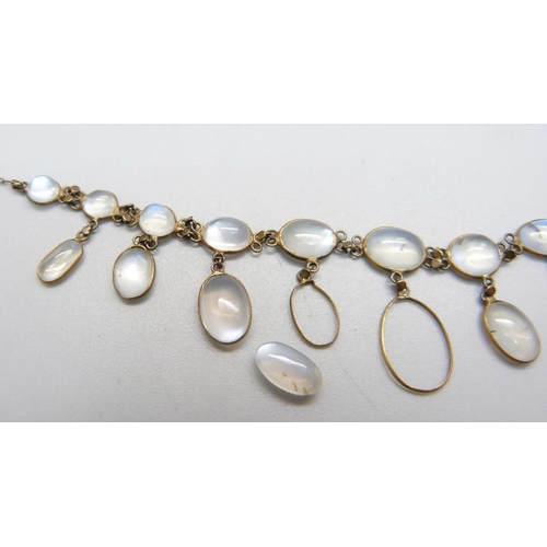 1035 - A moonstone necklet, one stone loose and lacking one stone