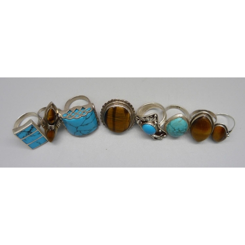 1037 - Four silver and turquoise rings and four silver and tigers eye rings, 87.47g