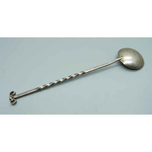 1043 - A white metal spoon marked MK1, (possibly a Russian caviar spoon), tests as silver