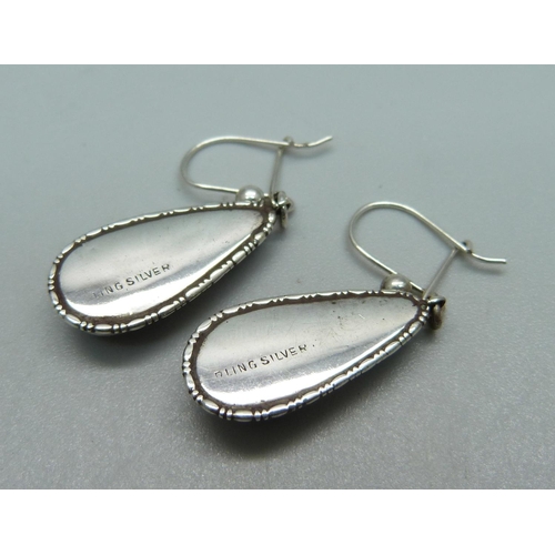 1048 - A pair of silver butterfly wing earrings