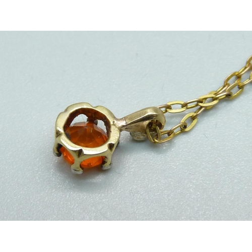 1058 - An antique fire opal pendant mounted in gold, claws tipped in silver and set with rose diamonds, (la... 